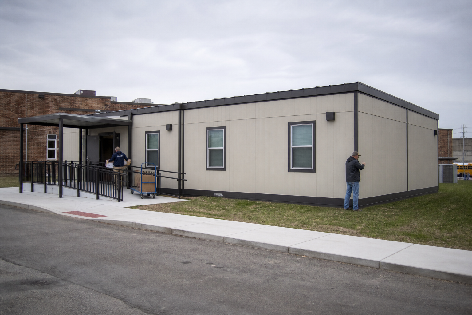 Modular classroom building added to an active school campus