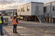 Rental modular office arriving at an active logistics yard